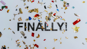 Image showing the word FINALLY! with confetti scattered about